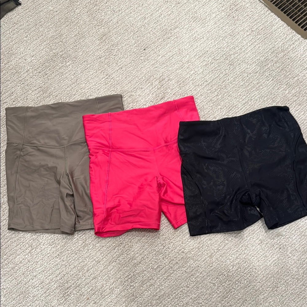 All in Motion Women's Bike Shorts - Black snake skin, Pink, and Tan